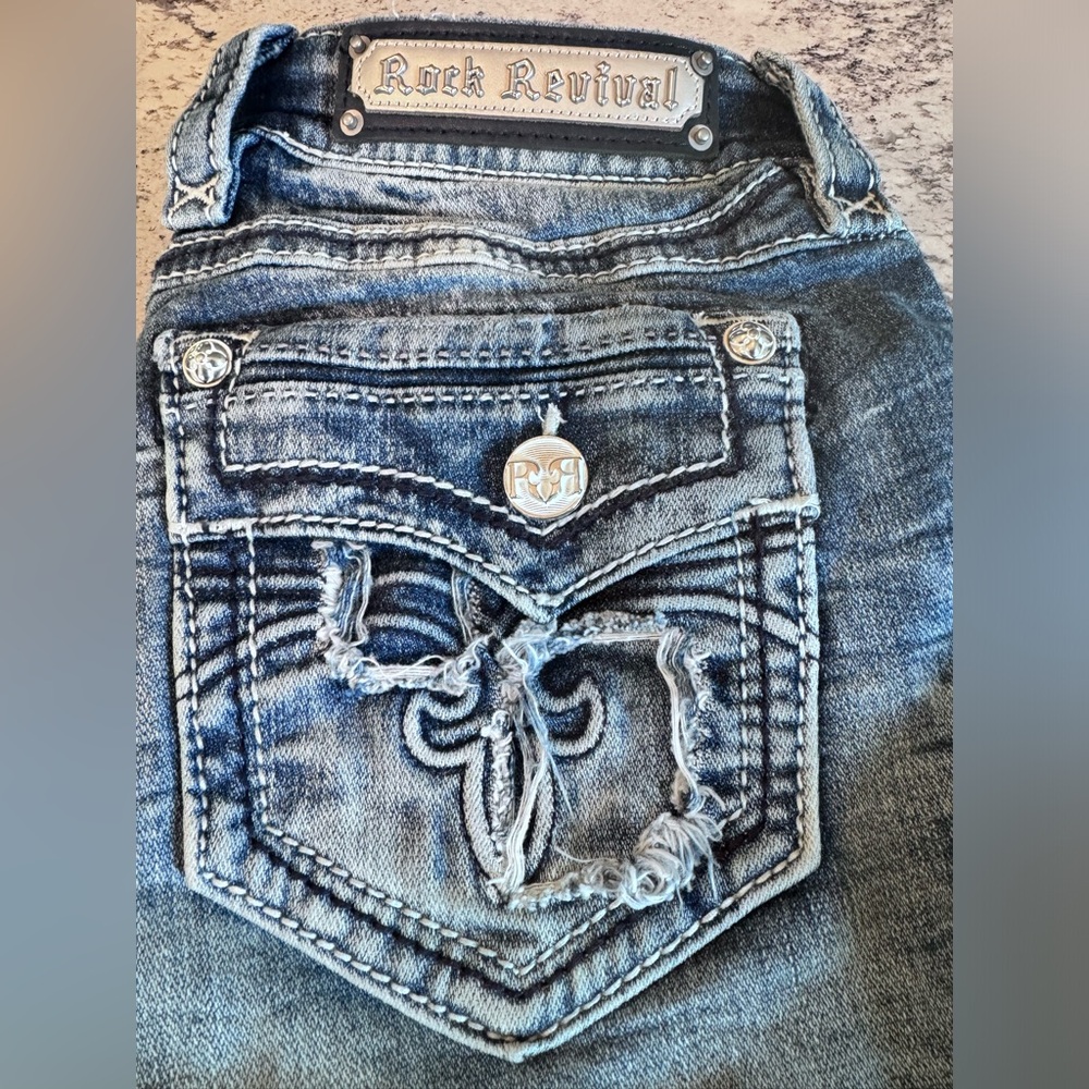 Rock Revival Mid-Rise Ankle Skinny Jeans.